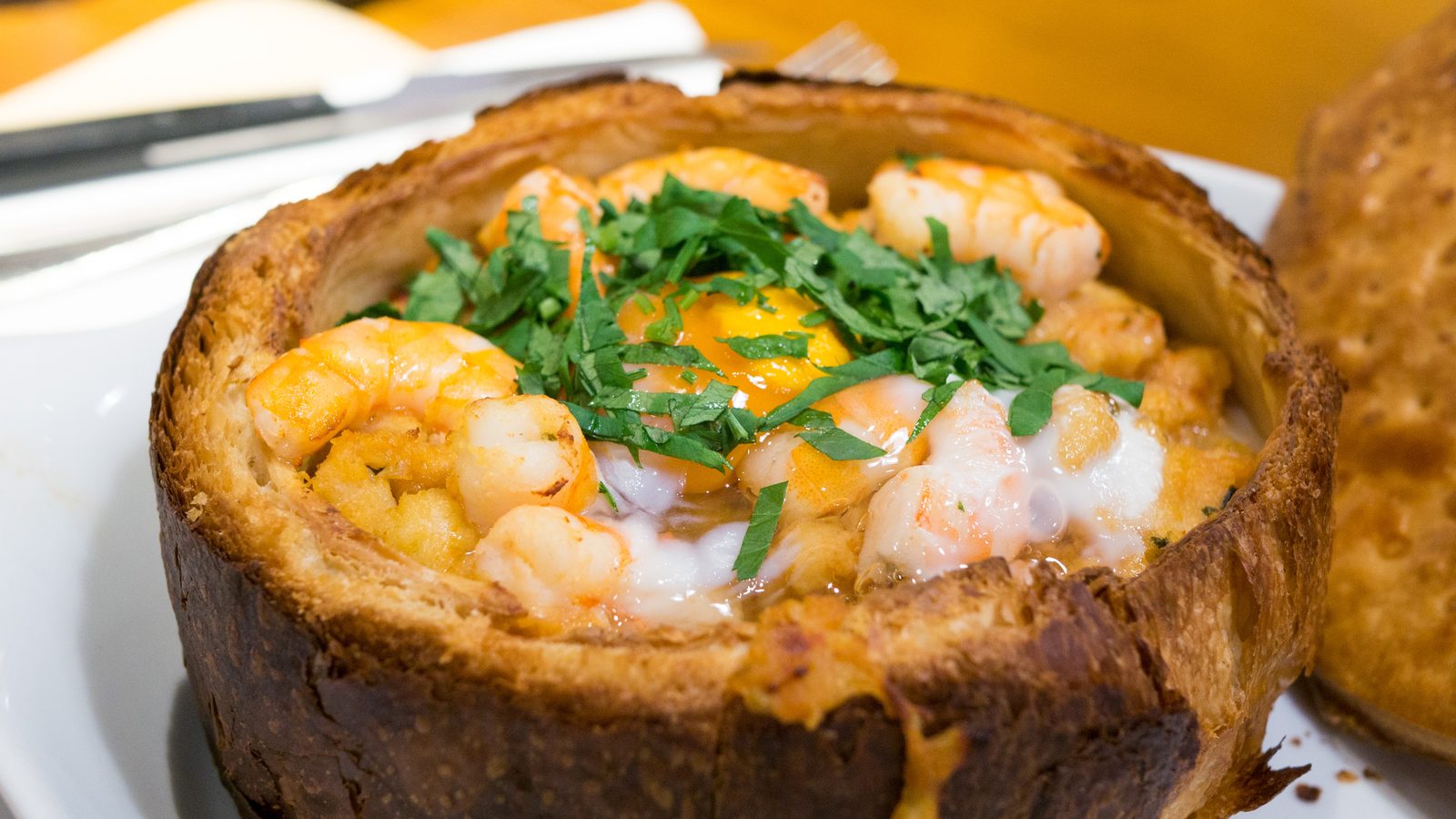 Shrimp açorda served in a golden puff pastry shell, Porto restaurant